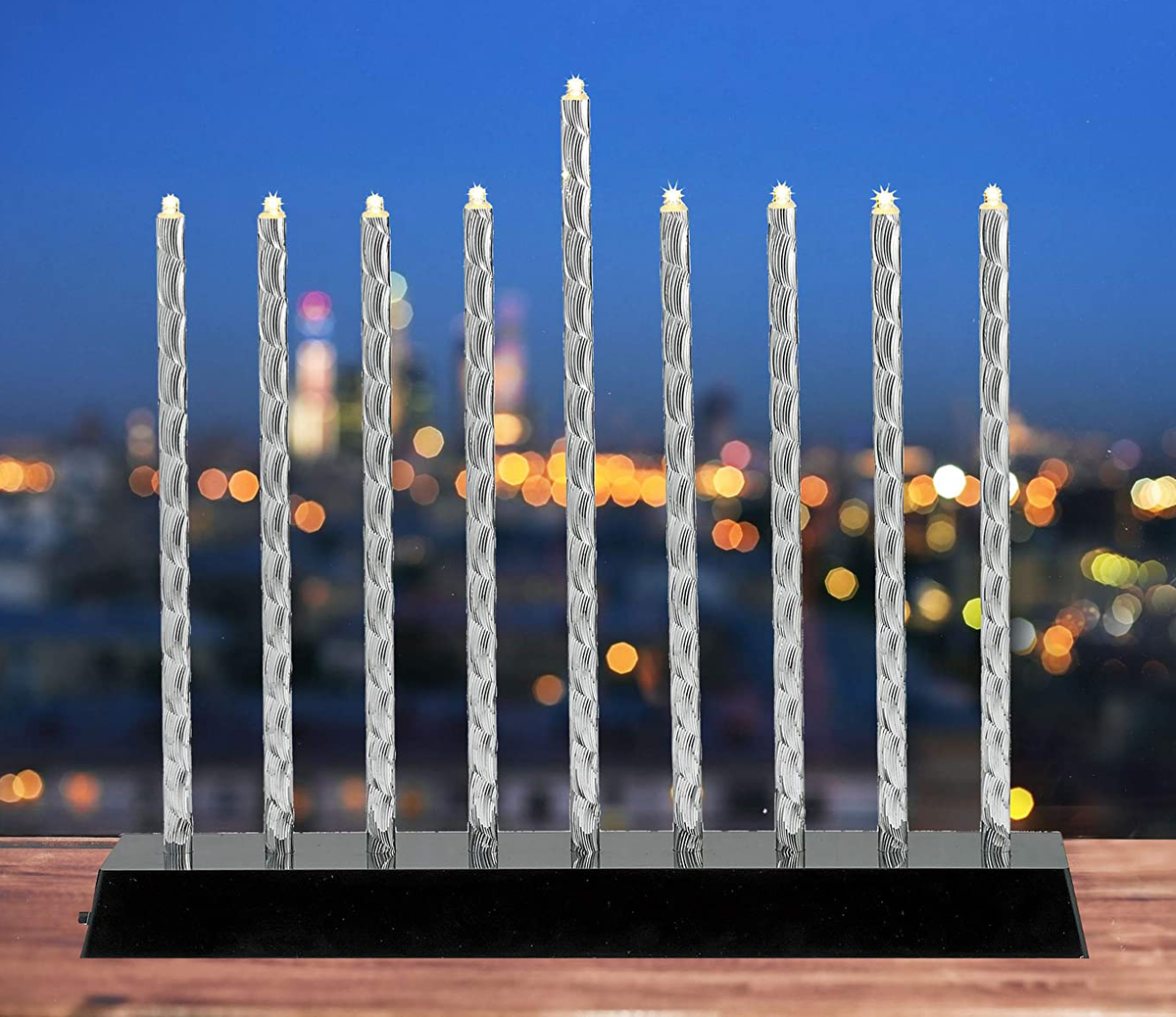 The is the beautiful "diamond-cut" aluminum menorah without the acrylic art attached.